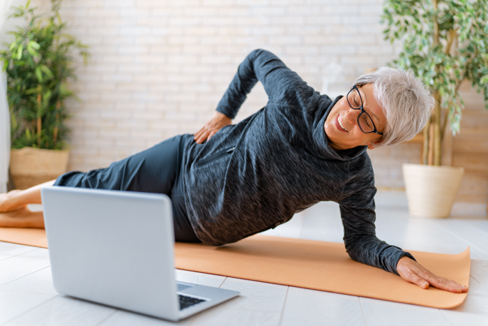 senior woman exercising at home.
